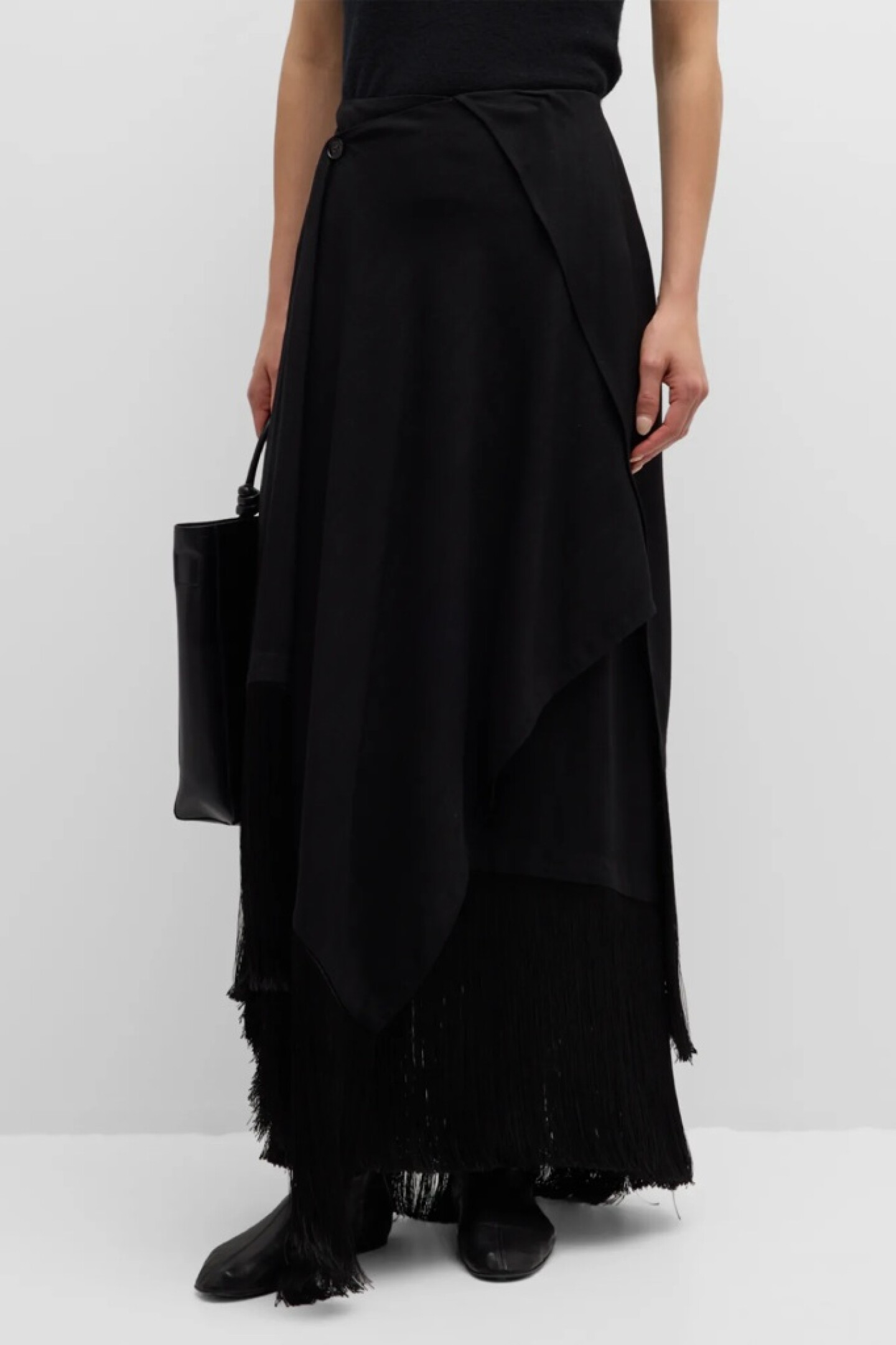 12 faldas boho para llevar con botas y vestir elegante sin esfuerzo este Invierno 2024