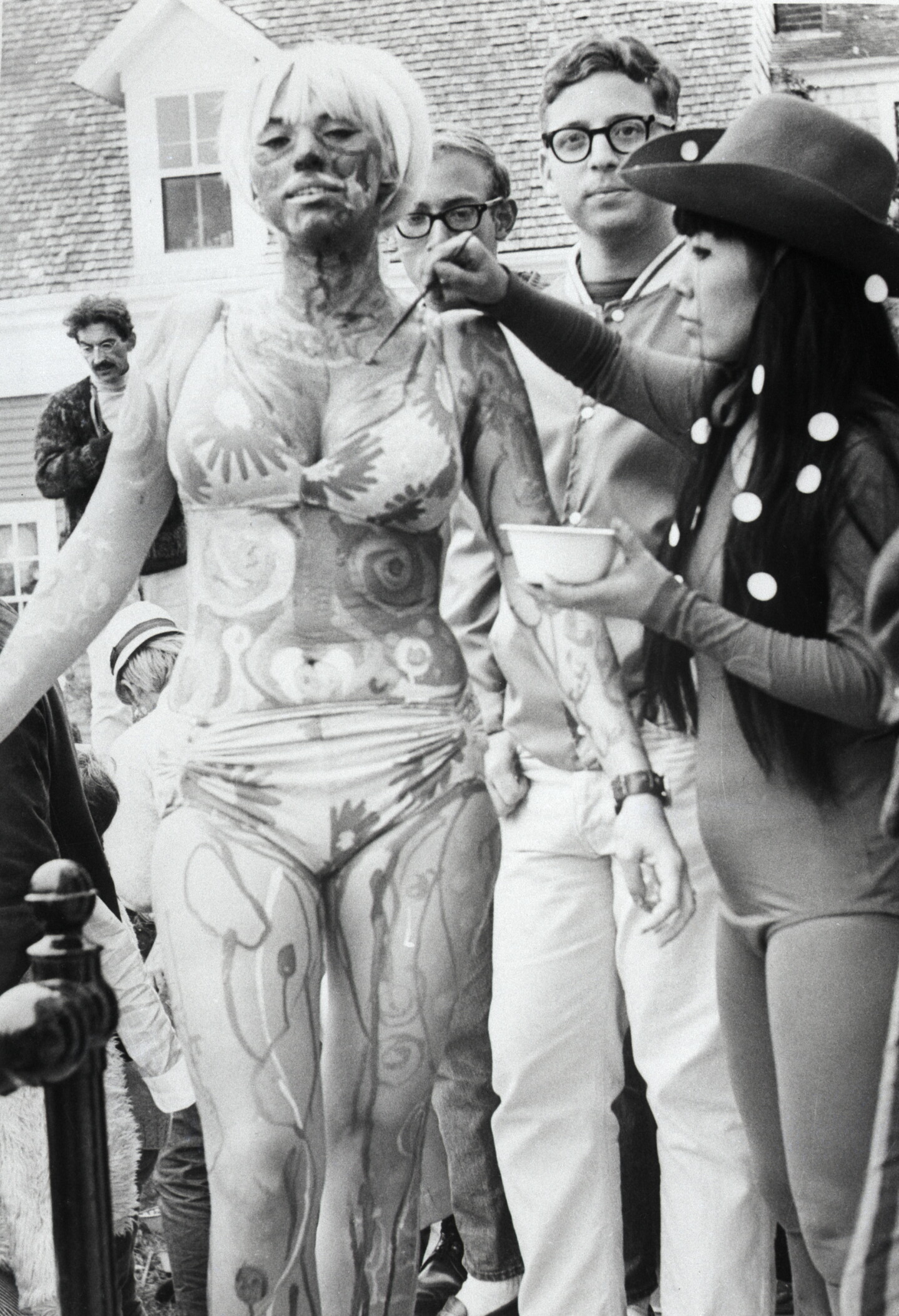 Hippie Having Body Painted